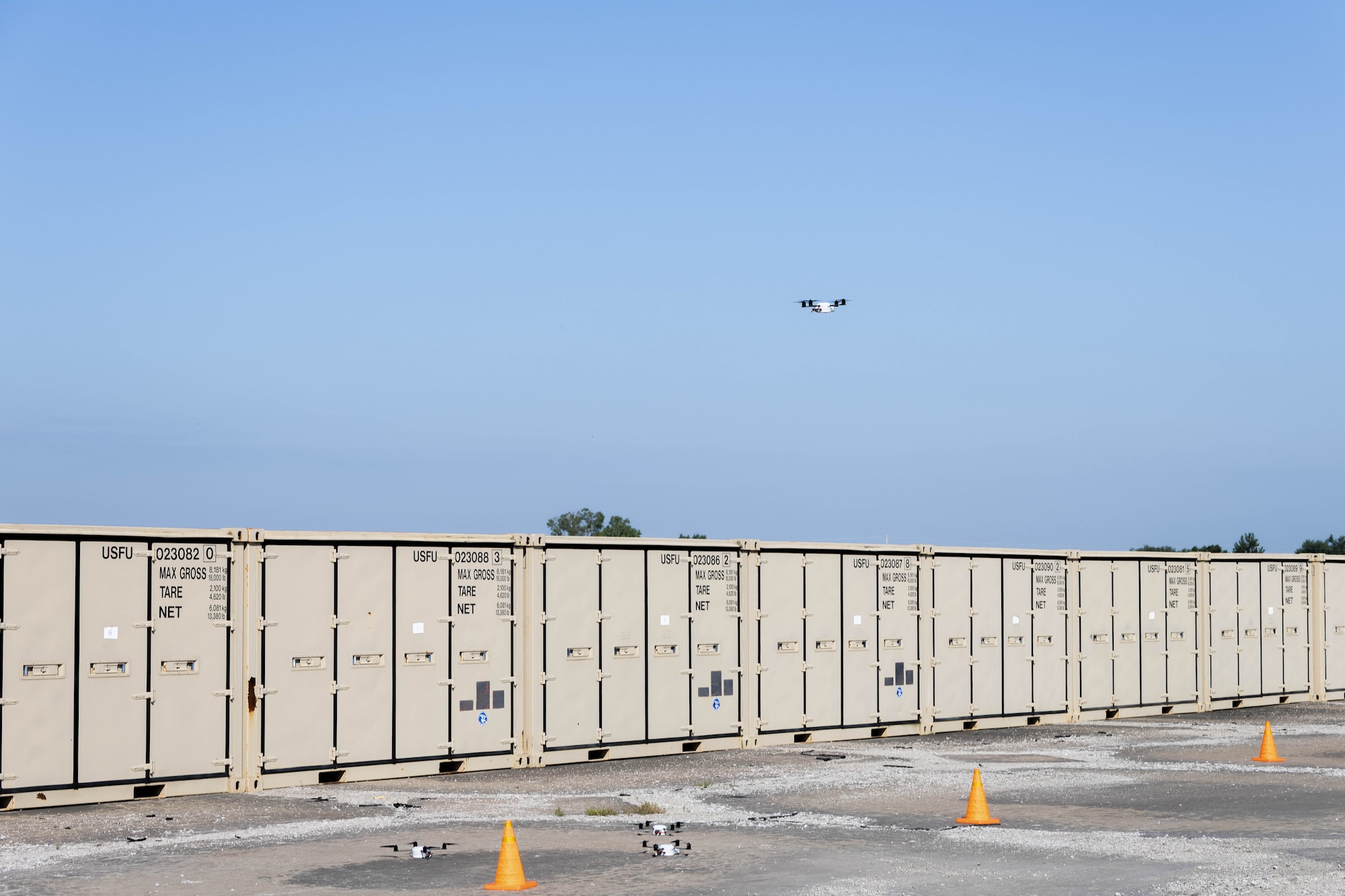 Personnel assigned to the 184th Wing's Point Defense Battle Lab (PDBL) fly small unmanned aircraft systems (sUAS) to replicate realistic adversary tactics during a Point Defense Assessment at the 190th Air Refueling Wing, Topeka, Kansas, July 13-16, 2026. The PDBL serves as Air Combat Command’s designated "aggress and assess" organization, helping installations evaluate and refine their defensive tactics, techniques, and procedures under realistic conditions. (U.S. Air National Guard photo by Staff Sgt. Meagan Gardner)