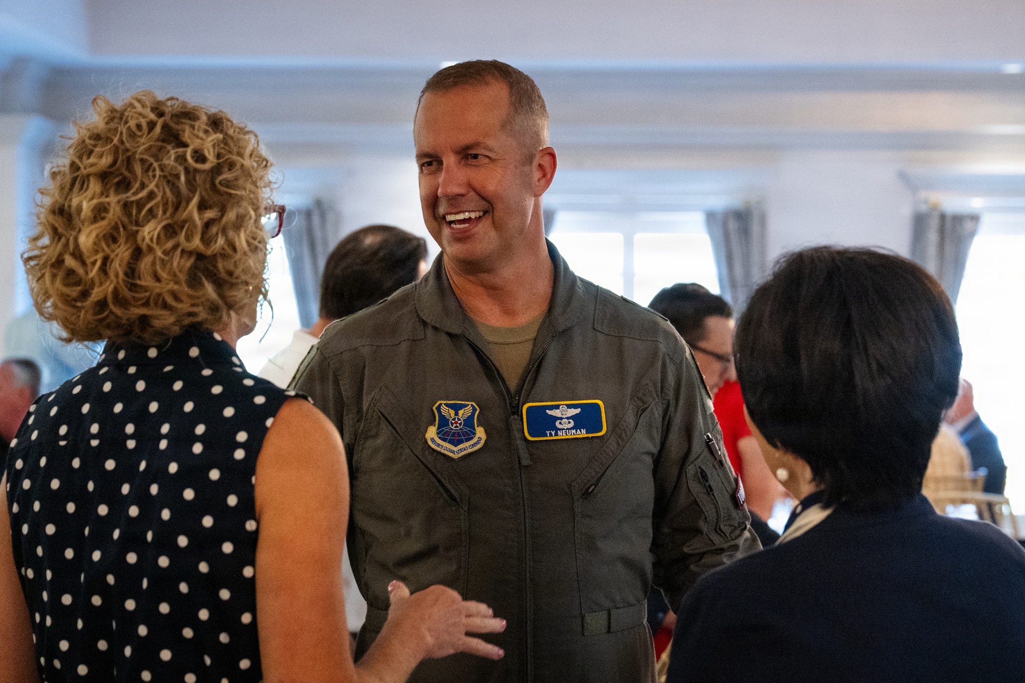 U.S. Air Force Maj. Gen. Ty Neuman, Eighth Air Force and Joint-Global Strike Operations Center commander, talks with civic leaders at a Military Affairs Council luncheon in Abilene, Texas, July 30, 2026. Neuman was the guest speaker for the quarterly luncheon where he met with leaders across Abilene and advocated for both the installation and Airmen stationed at Dyess Air Force Base. (U.S. Air Force photo by Senior Airman Jade M. Caldwell)