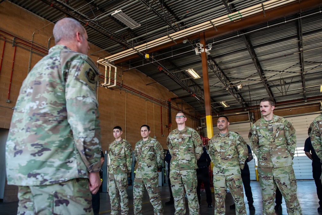 Commander addresses Airmen.