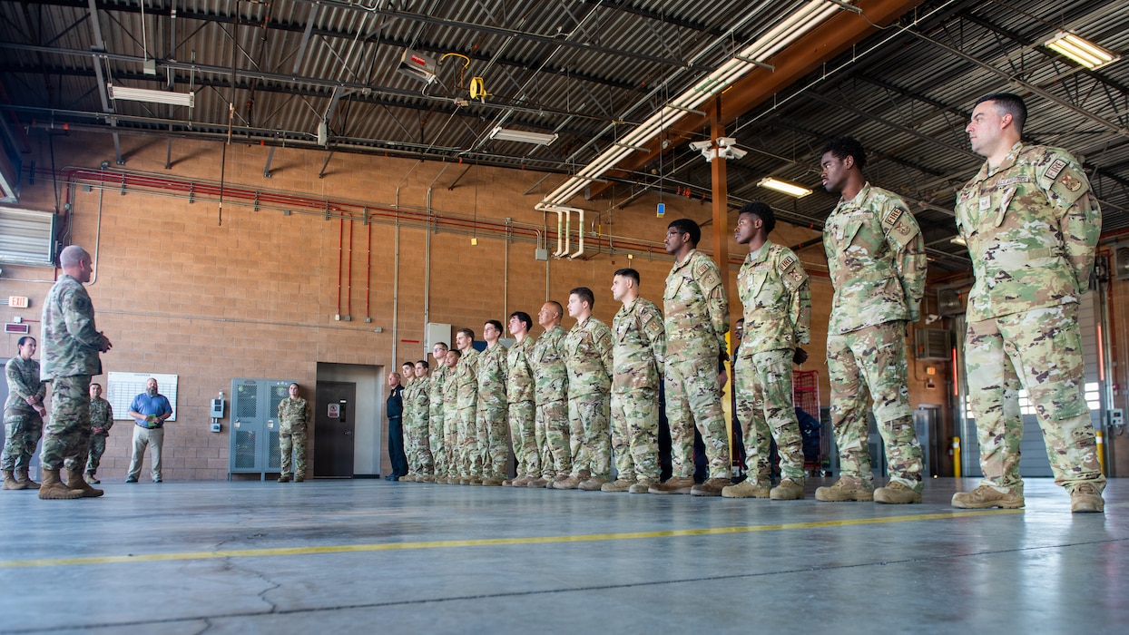Airmen stand in a formation