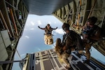 A U.S. Air Force special tactics Airman from the Kentucky Air National Guard’s 123rd Airlift Wing jumps into Henry E. Rohlsen Airport near Christiansted in St. Croix, U.S. Virgin Islands, Aug. 26, 2025 as part of Emerald Warrior 25.2, a large-scale special operations exercise being staged in multiple locations by Air Force Special Operations Command. The Airman, joined by 10 other combat controllers and pararescuemen, took control of the airfield to receive follow-on aircraft in support of simulated combat and contingency operations. Photo by Phil Speck.