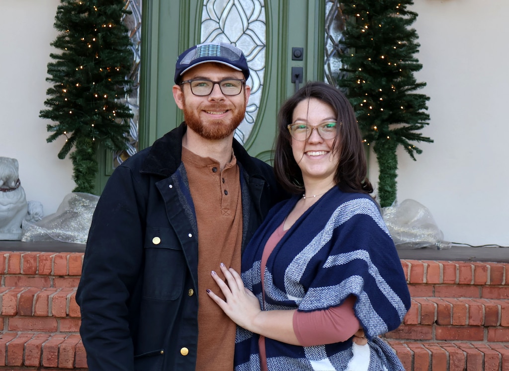Timothy "Jay" Caldwell II, U.S. Army Corps of Engineers, Mobile District cost engineer, and his wife, Brittany, pose for a family photo at Caldwell's parents' house in Spanish Fort, Alabama, Dec. 25, 2025. Caldwell, who started working in the Mobile District when he was in high school, recently won the 2026 Cost Engineer of the Year for MILCON for the 2026 Engineering and Construction Community of Practice Awards. (Courtesy photo)