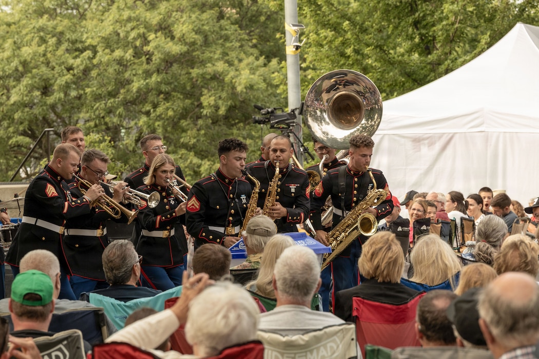U.S. Marines with 2nd Marine Aircraft Wing Band perform during the 49th annual Sturgis Falls Celebration at Cedar Falls, Iowa, June 27, 2026. The 2nd MAW Band took part in the celebration to strengthen community relations and reaffirm the history, customs, and traditions representative of the Marine Corps. (U.S. Marine Corp photo by Pfc. Keani Guthmueller)