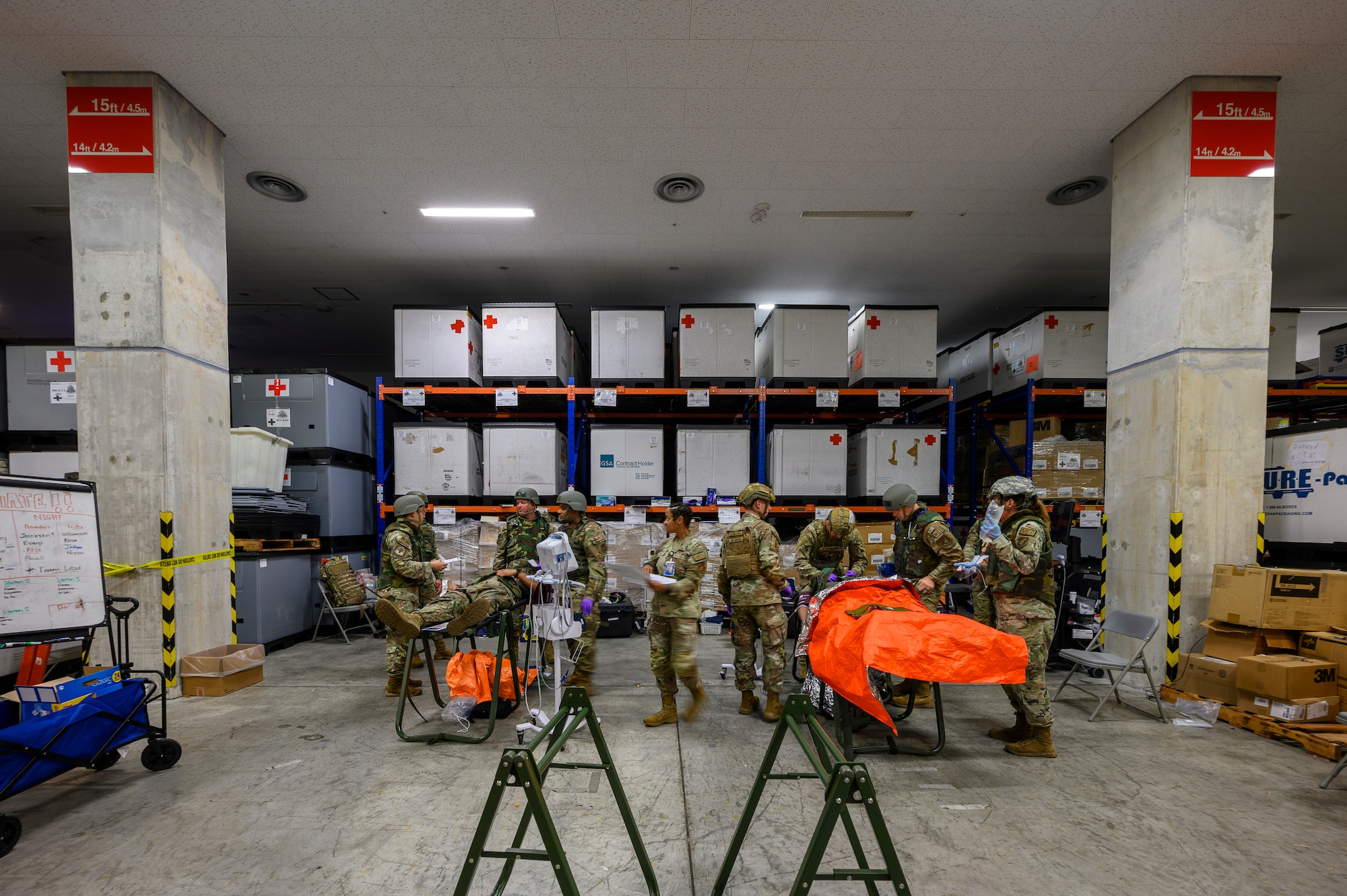 U.S. Air Force medical personnel assigned to the 18th Medical Group provide care to simulated patients during an En-Route Patient Staging System exercise as part of Beverly Beach 26-1 at Kadena Air Base, Japan, Aug. 4, 2026. The exercise tested the unit's ability to receive, stabilize and prepare patients for aeromedical evacuation in an expeditionary environment. (U.S. Air Force photo by Airman 1st Class Francisco Huerta)