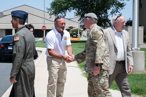 U.S. Air Force Chief Master Sgt. Elijah Edwards, 436th Airlift Wing command chief, greets Honorable Paul Hertz, Kent County Levy Court commissioner, at Dover Air Force Base, Delaware, July 24, 2026. Levy Court members were briefed on the 436th AW mission and current operations. (U.S. Air Force photo by Senior Airman Liberty Kuhn)