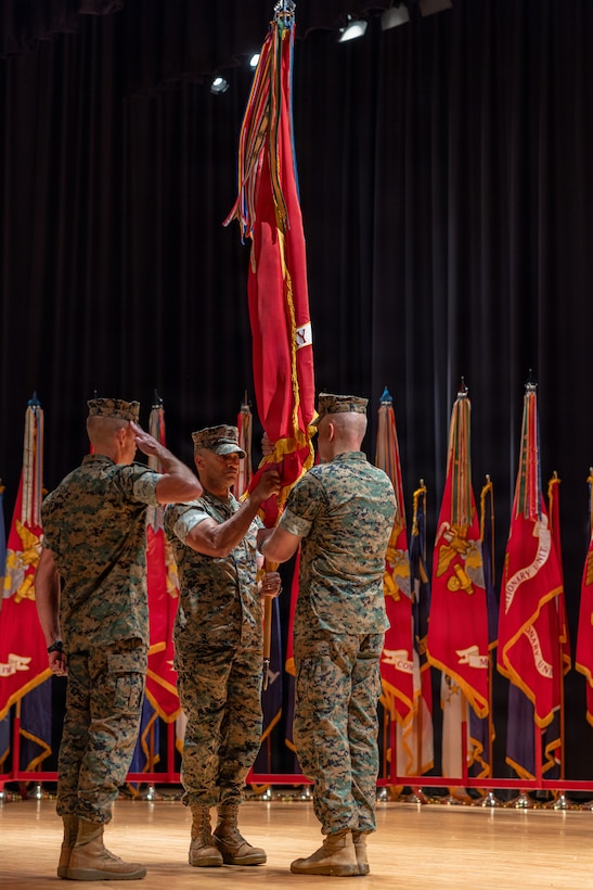 U.S. Marine Corps Lt. Gen. Calvert L. Worth Jr., center, the offgoing commanding general of II Marine Expeditionary Force, transfers the colors to Lt. Gen. Robert C. Fulford, the oncoming commanding general, during the II MEF Change of Command ceremony at Marine Corps Base Camp Lejeune, North Carolina, Aug. 4, 2026. The change of command ceremony symbolizes the passing of authority and responsibility from the offgoing to the oncoming commanding officer. (U.S. Marine Corps photo by Lance Cpl. Ethan Claassen)