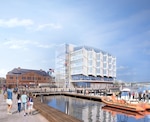 A rendering shows the future National Coast Guard Museum along the Thames River waterfront in New London, Connecticut. The 80,000-square-foot museum, scheduled to open to the public during the week of Aug. 2, 2027, will be the nation’s first national museum dedicated to preserving and sharing the history, heritage and enduring missions of the U.S. Coast Guard. (U.S. Coast Guard rendering)