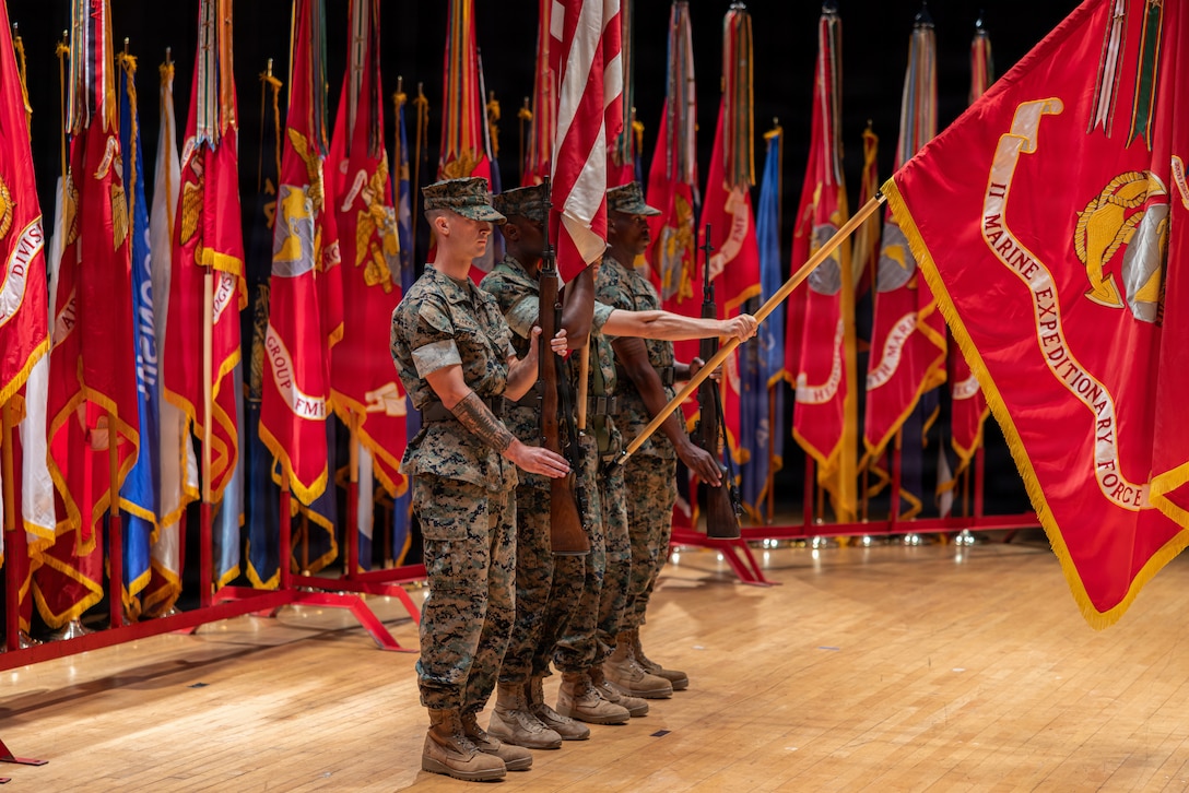 U.S. Marines with II Marine Expeditionary Force, present the colors during the II MEF Change of Command ceremony at Marine Corps Base Camp Lejeune, North Carolina, Aug. 4, 2026. The change of command ceremony symbolizes the passing of authority and responsibility from the offgoing to the oncoming commanding officer. (U.S. Marine Corps photo by Lance Cpl. Ethan Claassen)