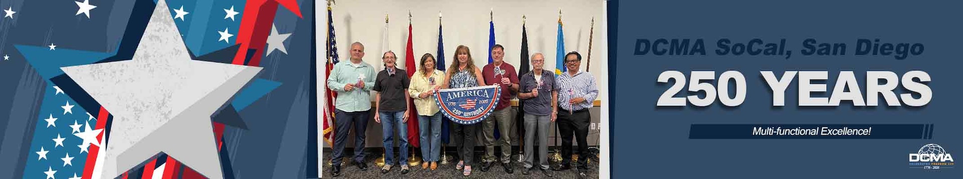 A group stands together and poses for a photo