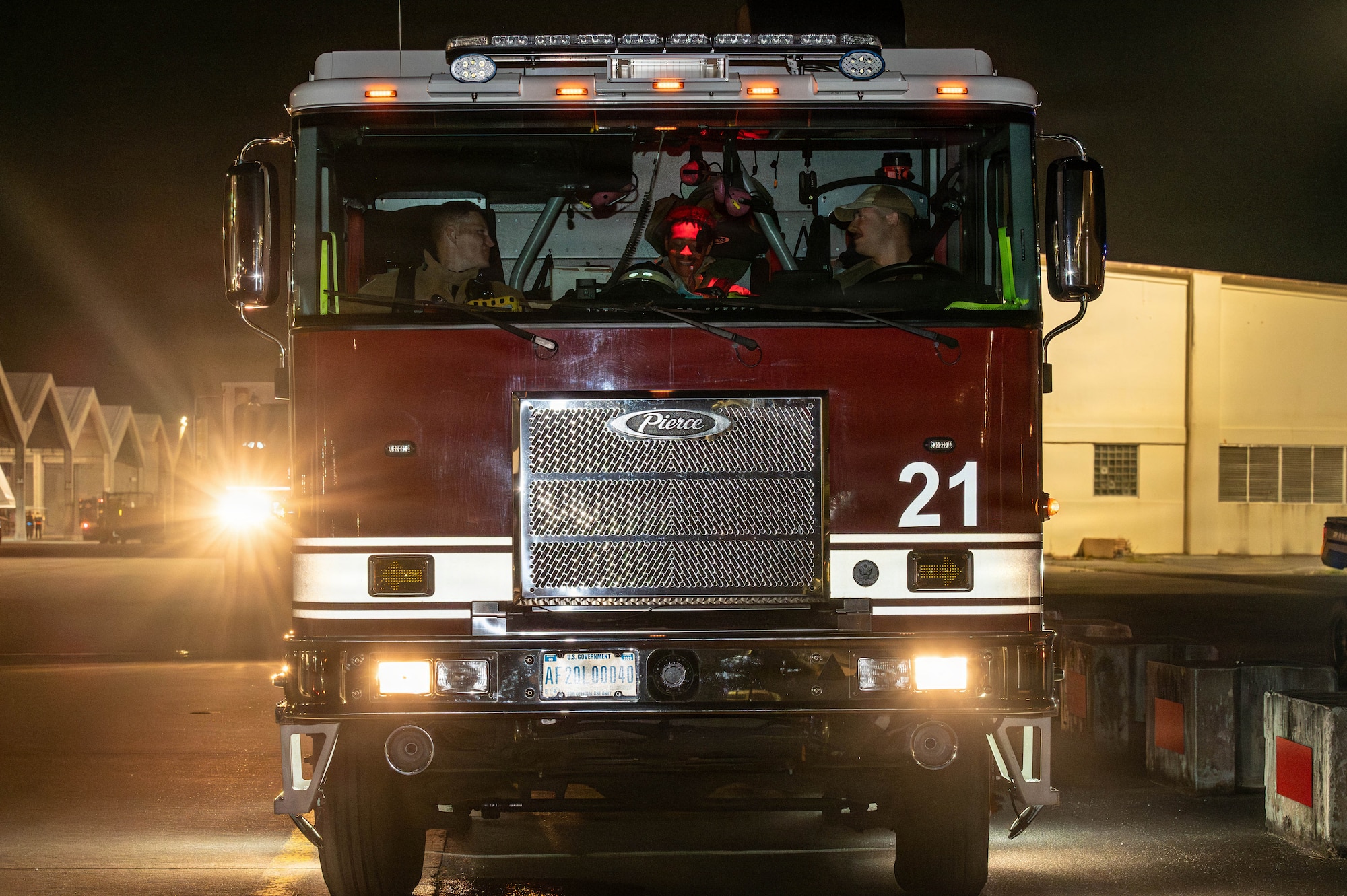 Firetruck parked by flightline.