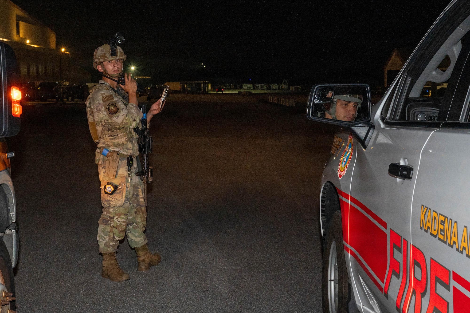 Service member uses radio.