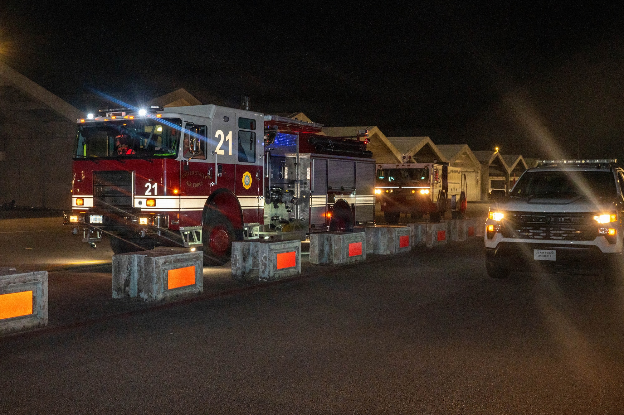Firetruck parked by flightline.