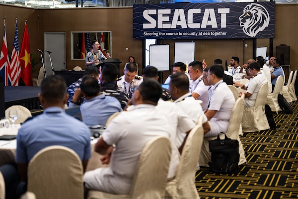 Mr. Brian Kawamura, maritime operations specialist, delivers maritime domain awareness training to participants and attendees during Southeast Asia Cooperation and Training (SEACAT) in Singapore, Aug. 4, 2026.