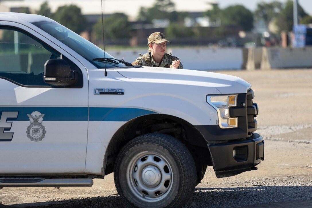 Defenders assigned to the 190th Security Forces Squadron coordinate response operations during the first-ever Point Defense Assessment (PDA) at the 190th Air Refueling Wing, Topeka, Kansas, July 13-16, 2026. The assessment allowed defenders to stress-test their counter-unmanned aircraft system (C-UAS) operating procedures against realistic simulated threats, ensuring defender readiness and mission assurance. (U.S. Air National Guard photo by Staff Sgt. Meagan Gardner)