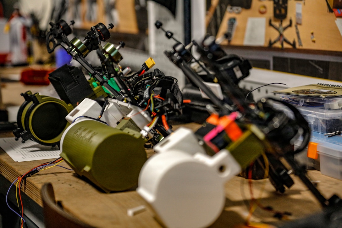 First-person view drones sit on an assembly line at the 173rd Mobile Brigade Combat Team (Airborne) Bayonet Innovation Team’s drone lab during a showcase of unmanned aircraft systems innovation at Caserma Del Din, Vicenza, Italy, July 22, 2026. The visit gave the Ghana delegation a firsthand look at how the U.S. Army designs, builds, and maintains small unmanned aircraft at the tactical level, including the 173rd MBCT’s in-house production. The exchange also advanced a partnership that provides insight into operating drones in extreme heat, informing U.S. system design and sustaining readiness and lethality in different environments. 



The engagement complements the Africa Multidomain Training and Experimentation Center effort in Morocco, a U.S. Africa Command and Morocco partnered initiative to help standardize drone proficiency and shared operational understanding with African nations. (U.S. Army photo by Staff Sgt. Catessa Palone)