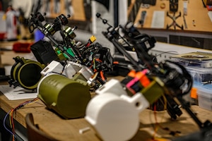 First-person view drones sit on an assembly line at the 173rd Mobile Brigade Combat Team (Airborne) Bayonet Innovation Team’s drone lab during a showcase of unmanned aircraft systems innovation at Caserma Del Din, Vicenza, Italy, July 22, 2026. The visit gave the Ghana delegation a firsthand look at how the U.S. Army designs, builds, and maintains small unmanned aircraft at the tactical level, including the 173rd MBCT’s in-house production. The exchange also advanced a partnership that provides insight into operating drones in extreme heat, informing U.S. system design and sustaining readiness and lethality in different environments. 



The engagement complements the Africa Multidomain Training and Experimentation Center effort in Morocco, a U.S. Africa Command and Morocco partnered initiative to help standardize drone proficiency and shared operational understanding with African nations. (U.S. Army photo by Staff Sgt. Catessa Palone)