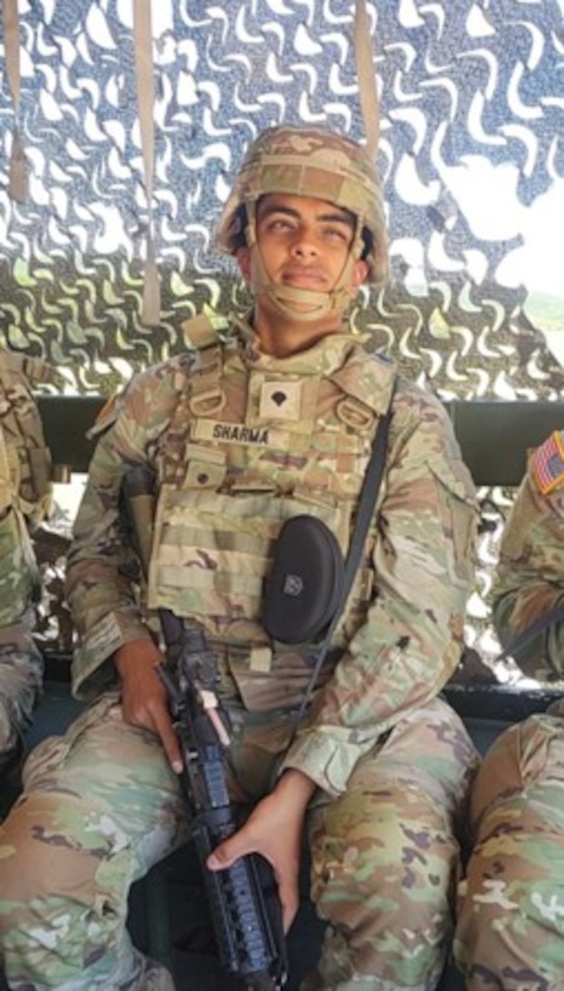U.S. Army Spc. Karan Sharma, 35th Air Defense Artillery Brigade fire direction center battle systems operator, was one of the off-duty U.S. Airmen and Soldiers who sprang into action after a bus overturned, assisting injured passengers until emergency services arrived.