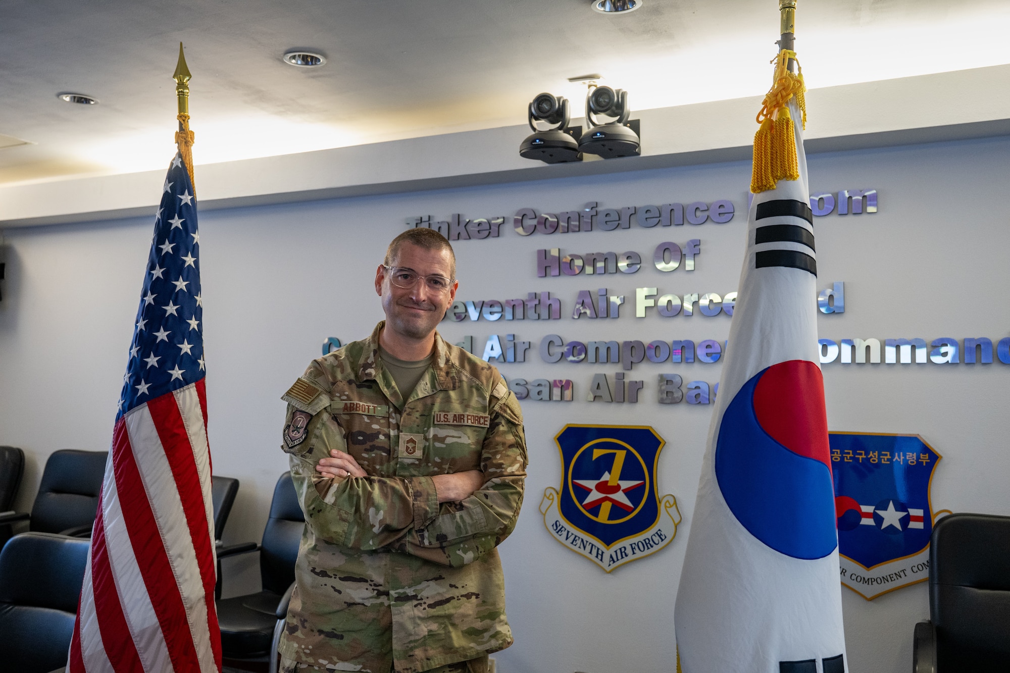 U.S. Air Force Chief Master Sgt. Brandon Abbott, Seventh Air Force A2 senior enlisted leader, poses for a picture at Osan Air Base, Republic of Korea, July 21, 2026. Abbott was one of the first people on scene to begin evacuating passengers from an overturned bus during an off-duty tour in Paju, ROK, June 2026.