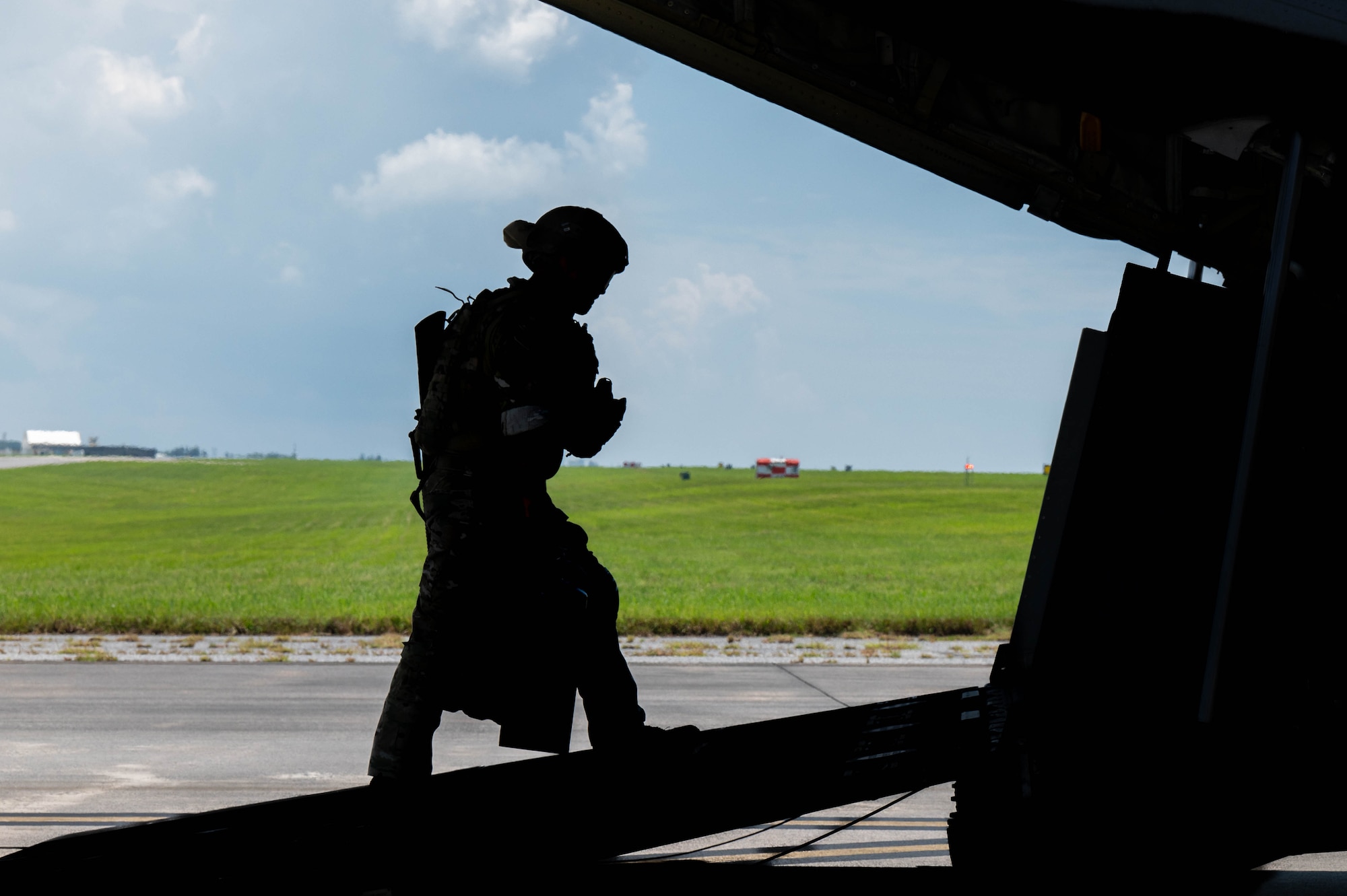 Airman walks towards the aircraft.