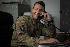 Person on the phone, smiling