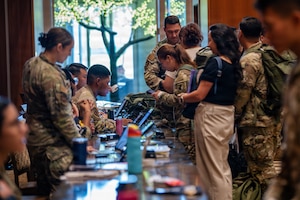 18th Wing participate in a simulated military assisted departure training during readiness exercise