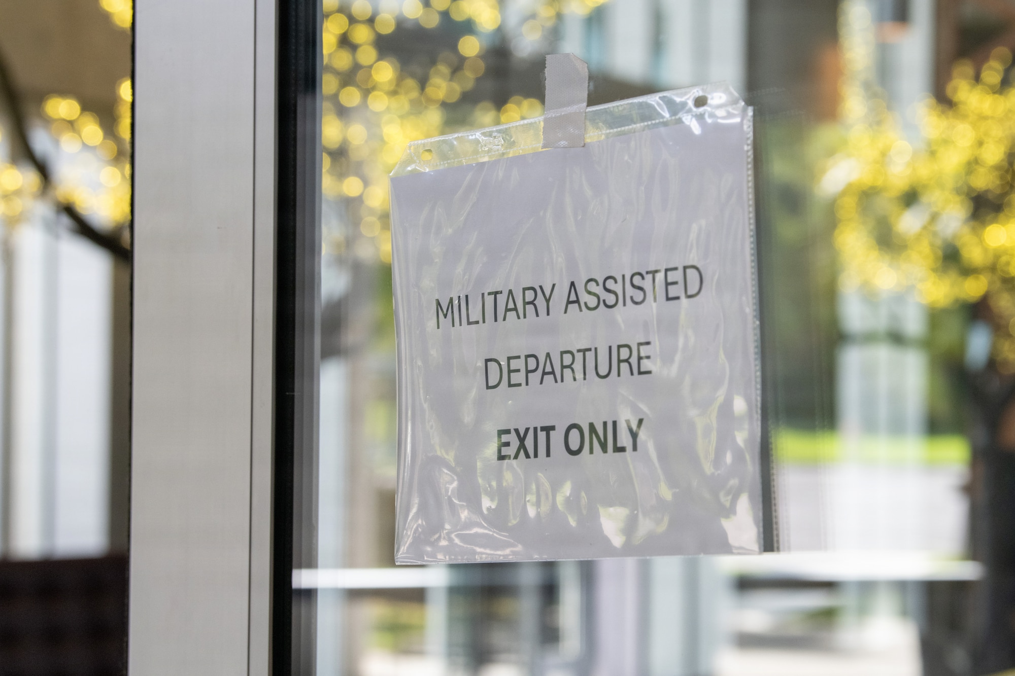 A military assisted departure sign is posted during readiness