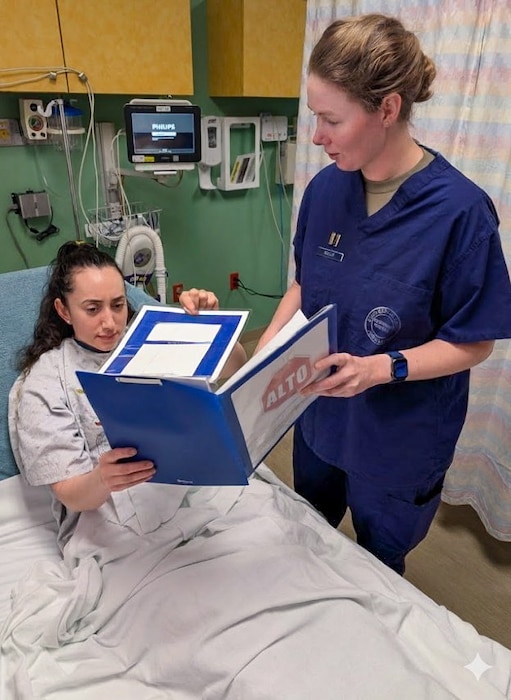 Image of an Airman treating a patient.