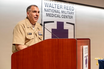 Rear Adm. Matthew Case, Acting Surgeon General and Director of the Medical Service Corps, speaks during Navy Medicine Readiness and Training Center Bethesda’s Medical Service Corps Birthday Ceremony at Walter Reed National Military Medical Center, August 4, 2026. NMRTC Bethesda's mission is to maximize warfighter performance through optimized medical readiness tailored to operational requirements; enhance the readiness of the medical force to sustain expeditionary medical capability; and train and develop the Navy Medicine Force. (U.S. Navy photo by Mass Communication Specialist Second Class Alec Kramer)