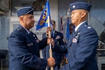 Air Force Brig. Gen. Phillip L. Mallory, Hawaii Air National Guard commander, passes the Headquarters Hawaii Air National Guard Recruiting and Retention Flight guidon to Air Force Lt. Col. Michael Buendia, Headquarters Hawaii Air National Guard Recruiting Flight commander, symbolizing Buendia's acceptance of command of the flight during the unit's activation ceremony held at Pearl Highlands Center in Pearl City, Hawaii, Aug. 1, 2026. Before the flight’s activation, recruiting and retention efforts fell under the Hawaii Air National Guard personnel directorate. The establishment of the Hawaii Air National Guard’s first dedicated Recruiting and Retention Flight creates a team focused on recruiting new Airmen, retaining experienced personnel and strengthening accession support across the organization. Photo by Tech. Sgt. Orlando Corpuz.