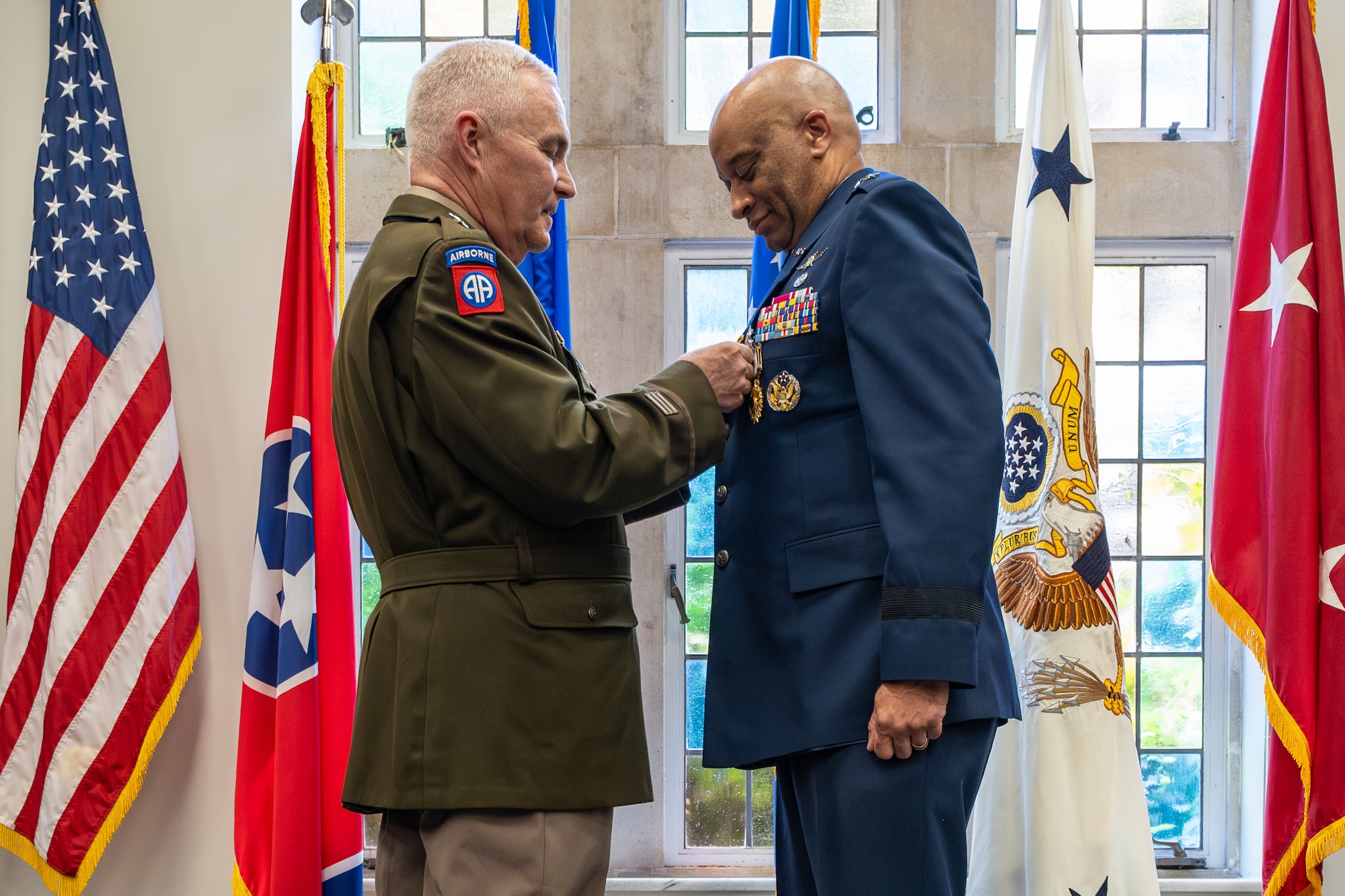 U.S. Army Maj. Gen. Haldane Lamberton, left, adjutant general of the Kentucky National Guard, presents U.S. Air Force Maj. Gen. Charles Walker, Air National Guard assistant to the judge advocate general of the United States Air Force, with a Kentucky Distinguished Service Medal at Walker’s retirement ceremony in Nashville, Tenn., July 24, 2026. Walker is concluding a distinguished 35-year career during which he previously served as director of the Office of Complex Investigations at the National Guard Bureau in Washington, D.C., chief of staff for the Air Component at Joint Force Headquarters—Kentucky National Guard, and staff judge advocate for the Kentucky Air Guard’s 123rd Airlift Wing in Louisville. (U.S. Air National Guard photo by Dale Greer)