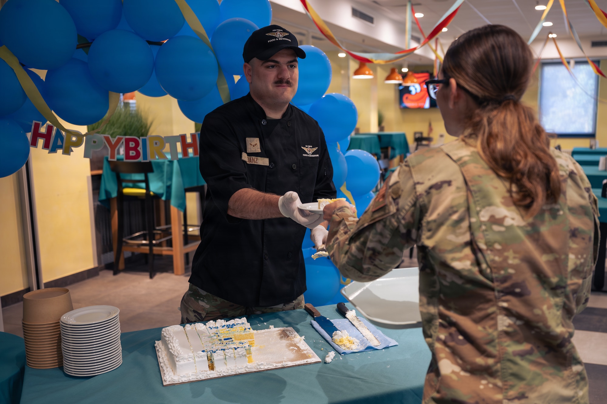 Airman serves cake