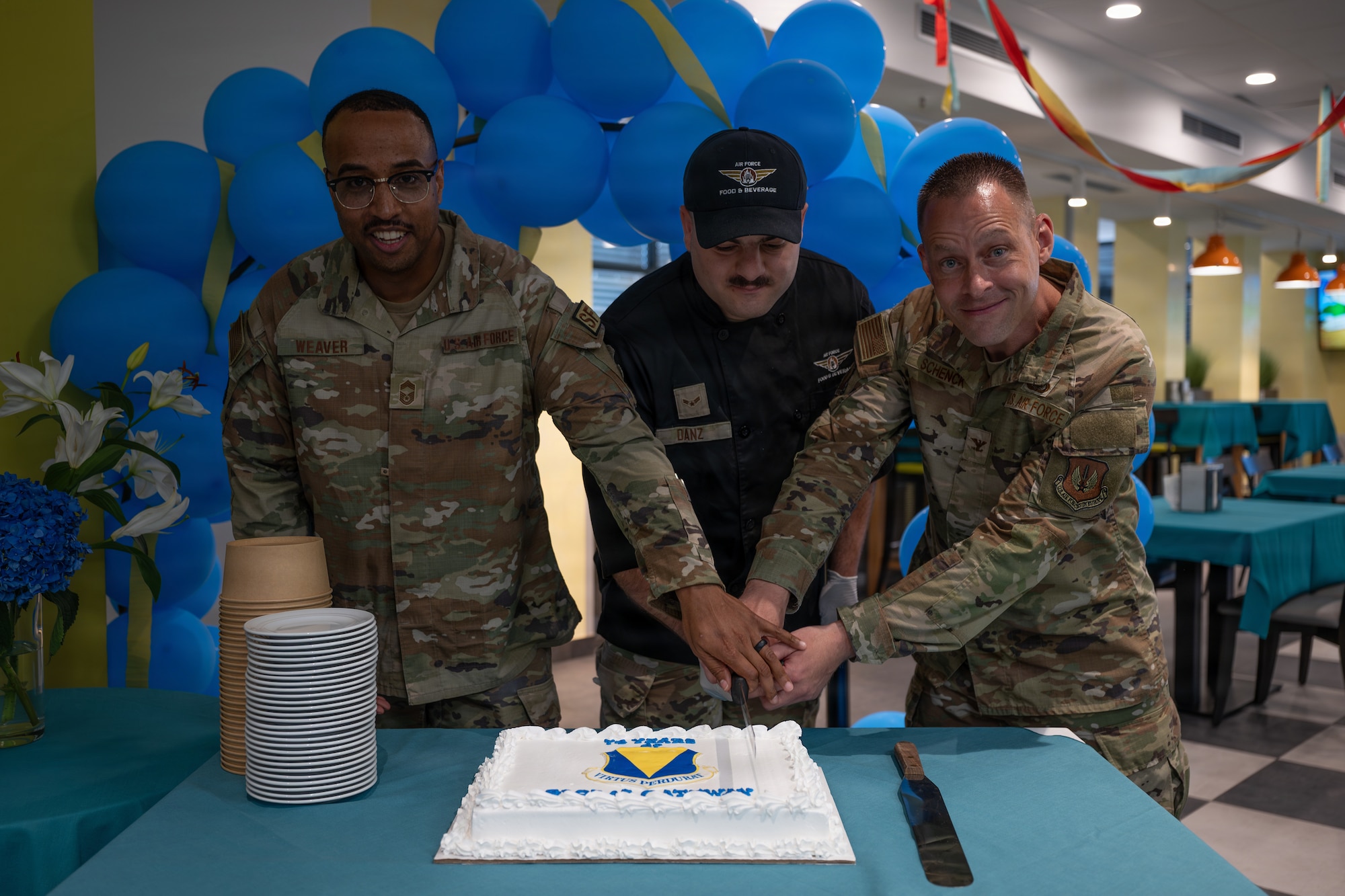 Airman cut cake