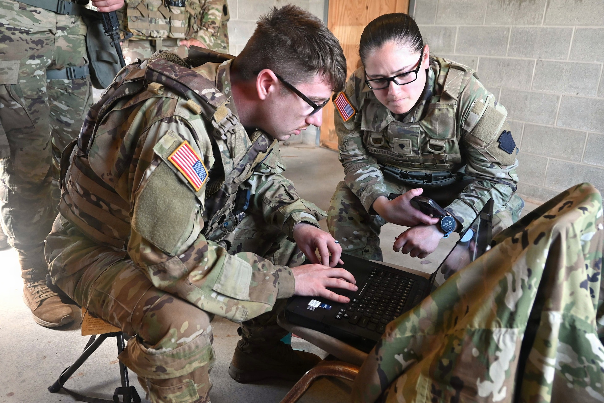 Soldiers from Mike Co., 56th Mobile Brigade Combat Team control an unmanned aircraft system during a multi-domain exercise conducted by the 556th Military Intelligence Co. Aug. 3, 2026 at Fort Indiantown Gap, Pennsylvania. (Pennsylvania National Guard photo by Brad Rhen)
