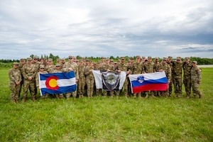 Medical personnel from the Colorado National Guard’s Chemical, Biological, Radiological, and Nuclear Enhanced Response Force Package pose for a photo alongside their counterparts from the Slovenian Medical Forces at the Vigorous Warrior Exercise, Tapa, Estonia, June 18, 2026. VW is NATO’s multinational medical exercise that trains military medical support with a strong focus on interoperability, medical readiness, and cooperation between civilian and military medical systems. (U.S. Air National Guard photo by 2nd Lt. Stephanie Zimmerman)