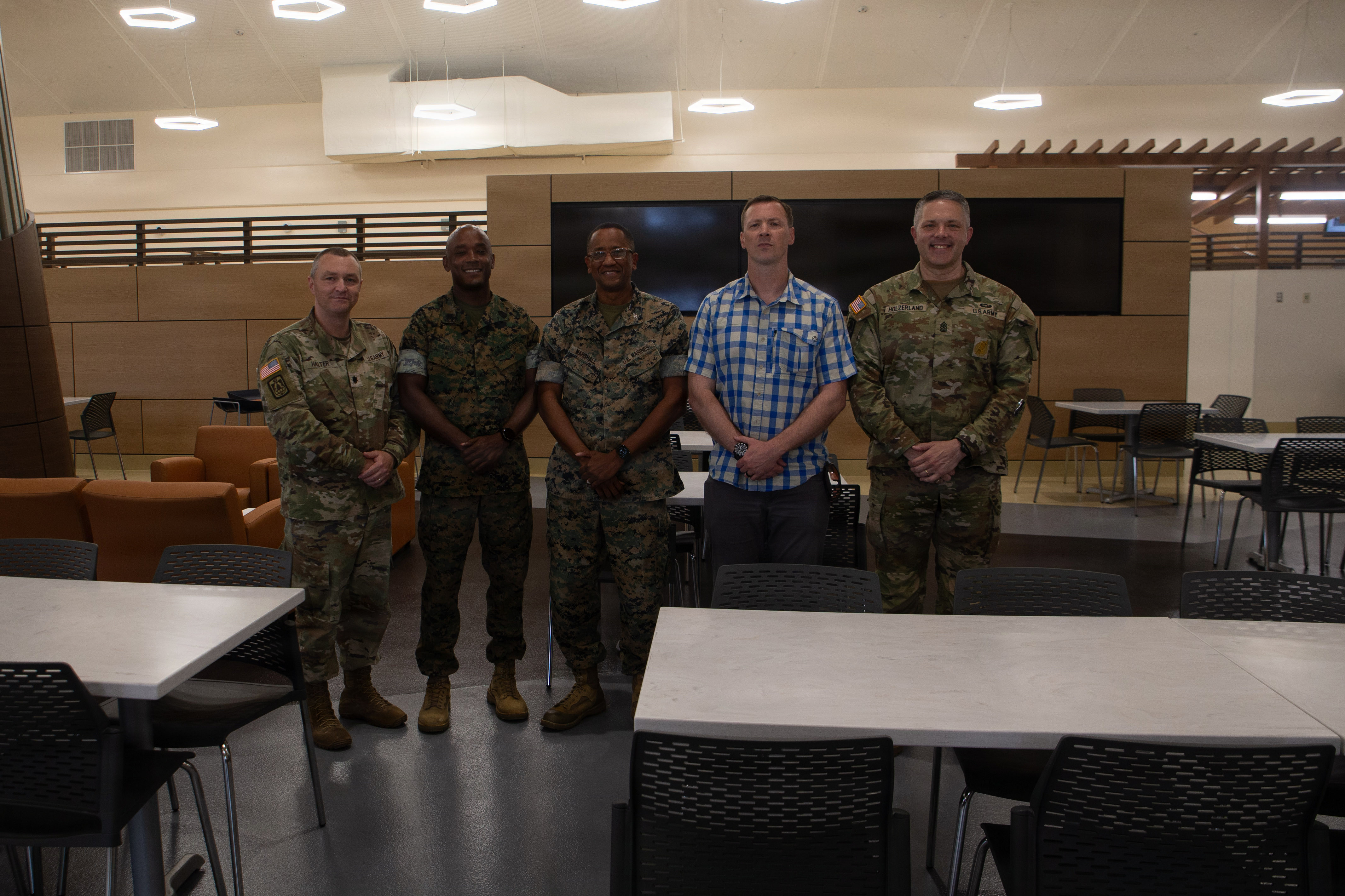 U.S. senior leaders with Marine Corps Base Camp Blaz and Task Force Talon, and the Honorable Mr. Tim Dill, Assistant Secretary of War for Manpower and Reserve Affairs, pose for a group photo, at Marine Corps Base Camp Blaz, Guam, July 10, 2026. Mr. Dill visited MCB Camp Blaz to tour the facility. (U.S. Marine Corps photo by Lance Cpl. Mark Dvoskin)