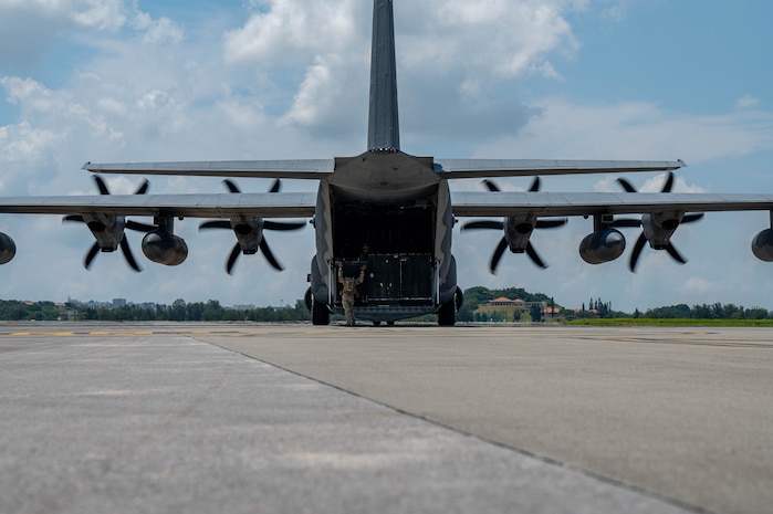 U.S. Air Force Airmen assigned to the 18th Logistics Readiness Squadron, finish loading up a U.S. Air Force MC-130J assigned to Kadena Air Base, during a forward arming and refueling point operation during readiness exercise Beverly Beach 26-1 at Kadena AB, Japan, Aug. 4, 2026. During the operation, Airmen rapidly service aircraft to minimize ground time and quickly return aircrews to the mission, strengthening combat readiness and operational flexibility across the Indo-Pacific. (U.S. Air Force photo by Airman 1st Class Nathaniel Jackson)