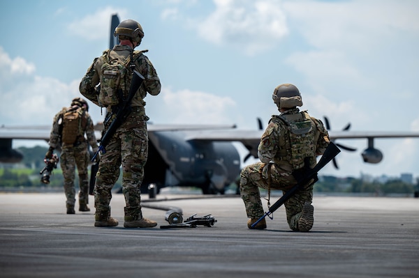 U.S. Air Force Airmen assigned to the 18th Logistics Readiness Squadron, prepare a fuel hose during a forward arming and refueling point operation on a U.S. Air Force MC-130J assigned to Kadena Air Base during readiness exercise Beverly Beach 26-1 at Kadena AB, Japan, Aug. 4, 2026. FARP operations enable Airmen to rapidly refuel aircraft, reducing ground time and increasing operational readiness in support of agile combat operations. (U.S. Air Force photo by Airman 1st Class Nathaniel Jackson)
