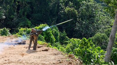 U.S. Marines assigned to 1st Low Altitude Air Defense Battalion, Marine Air Control Group 18, 1st Marine Aircraft Wing, fire a FIM-92 Stinger during Tenacious Archer 26 in Koror, Palau, July 30, 2026.