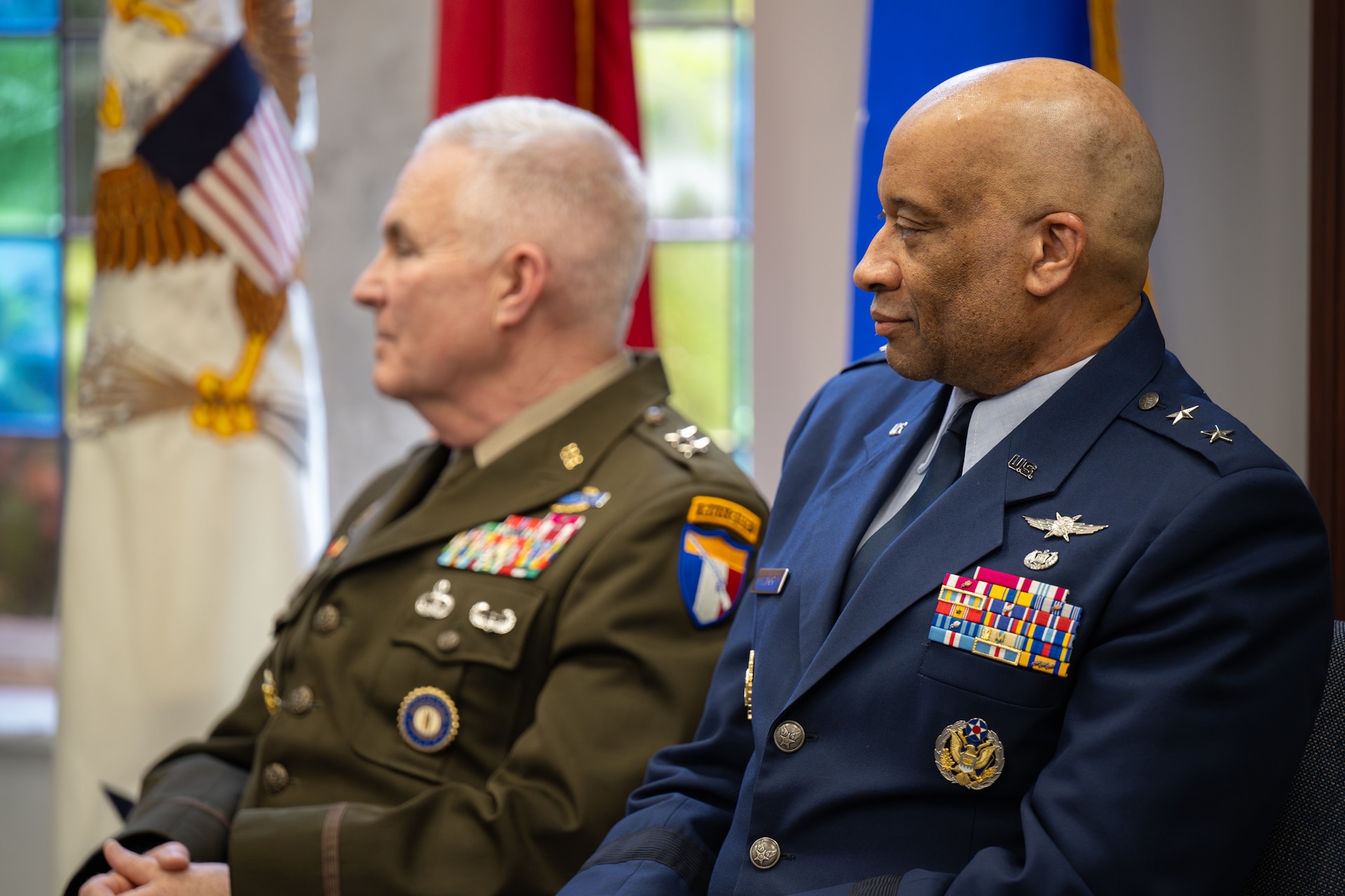 U.S. Army Maj. Gen. Haldane Lamberton, left, adjutant general of the Kentucky National Guard, and U.S. Air Force Maj. Gen. Charles Walker, Air National Guard assistant to the judge advocate general of the United States Air Force, listen to the comments of Charles Young III, general counsel of the U.S. Army, at Walker’s retirement ceremony in Nashville, Tenn., July 24, 2026. Walker is concluding a distinguished 35-year career during which he previously served as director of the Office of Complex Investigations at the National Guard Bureau in Washington, D.C., chief of staff for the Air Component at Joint Force Headquarters—Kentucky National Guard, and staff judge advocate for the Kentucky Air Guard’s 123rd Airlift Wing in Louisville. (U.S. Air National Guard photo by Dale Greer)