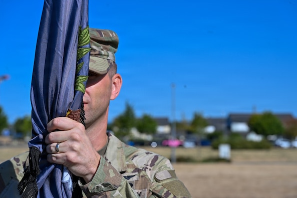 U.S. Army Lt. Col. Nathaniel Stickney accepts the Multi-Domain Effects Battalion colors, formally taking command of the unit during a change of command ceremony held in Wiesbaden, Germany, on Aug. 6, 2026. (U.S. Army photo by Sgt. 1st Class Rajheem Dixon)