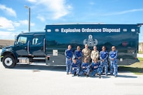 U.S. Air Force and Indonesian Air Force emergency ordnance disposal technicians gather in front of Bomb Squad Emergency Response Vehicle, or BSERV, as part of the Department of War National Guard Bureau State Partnership Program’s subject matter expert exchange held on Andersen Air Force Base, July 24, 2026.