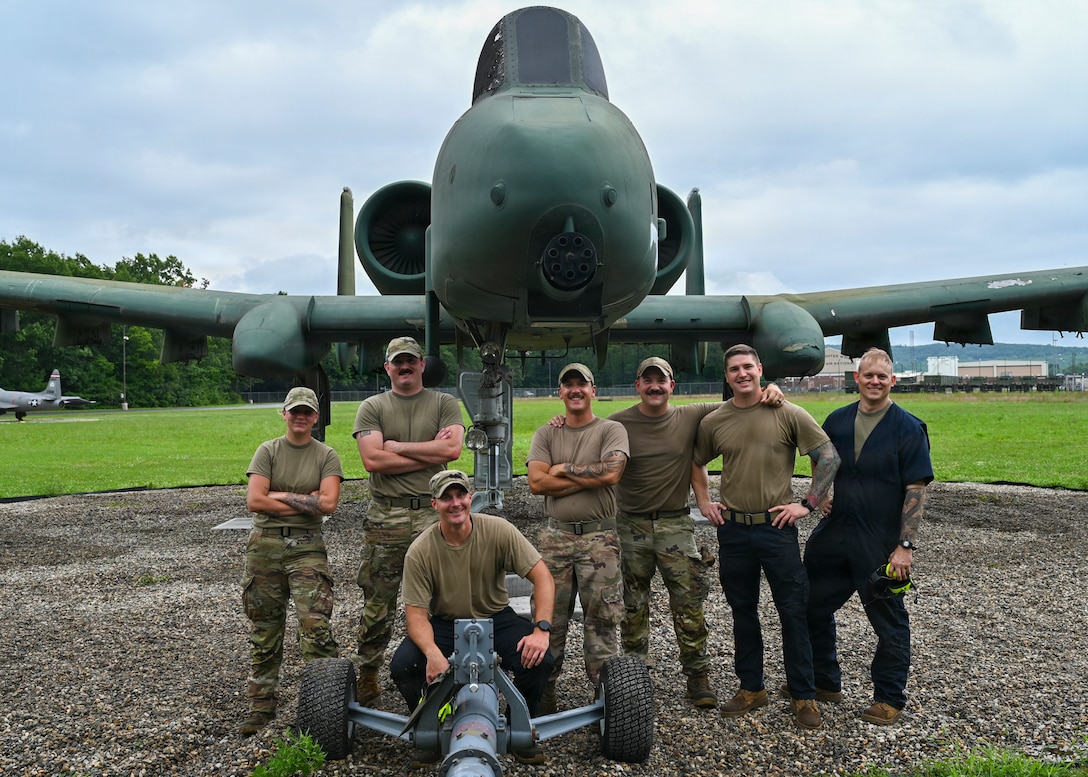 The 104th Fighter Wing crashed, damaged, disabled, aircraft recovery (CDDAR) team poses for a group photo after moving an A-10 Thunderbolt II static display to its new location in the 104FW "field of dreams," August 3, 2026, at Barnes Air National Guard Base, Westfield, Mass.

The field of dreams presents a visual history of static displays with past aircraft the wing has flown and preserves the aircraft's legacies. 

(U.S. Air National Guard Photo by Jay Hewitt)