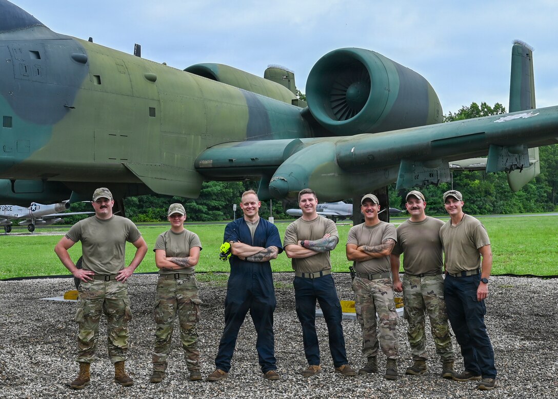 The 104th Fighter Wing crashed, damaged, disabled, aircraft recovery (CDDAR) team poses for a group photo after moving an A-10 Thunderbolt II static display to its new location in the 104FW "field of dreams," August 3, 2026, at Barnes Air National Guard Base, Westfield, Mass.

The field of dreams presents a visual history of static displays with past aircraft the wing has flown and preserves the aircraft's legacies. 

(U.S. Air National Guard Photo by Jay Hewitt)