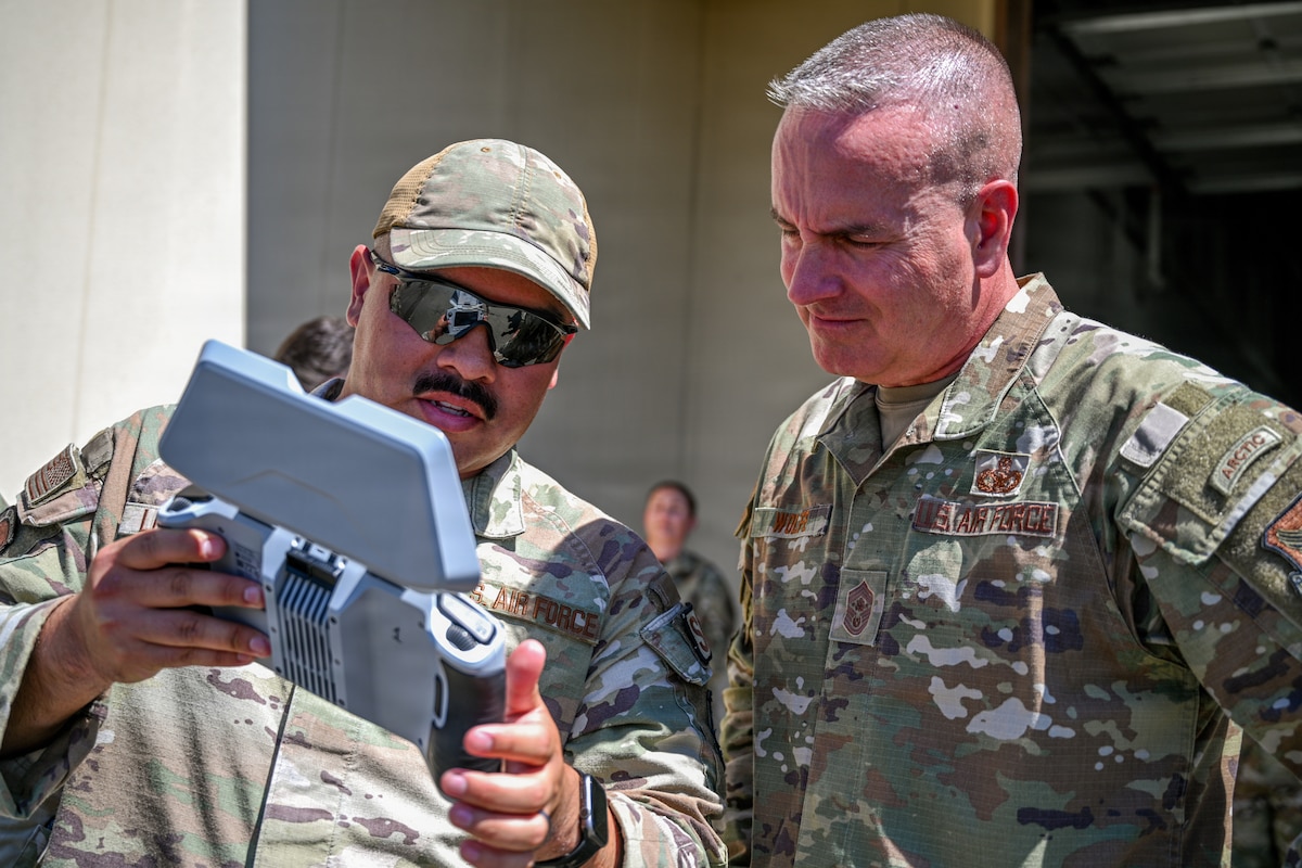 Airmen show controls to CMSgt Wolfe