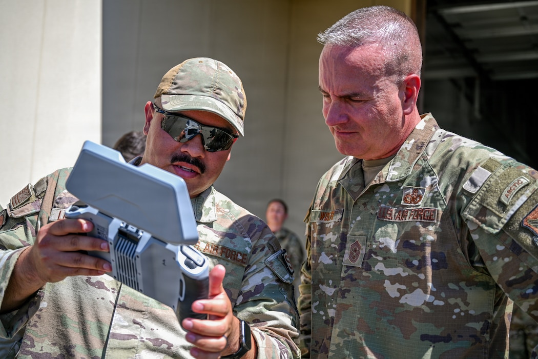 Airmen show controls to CMSgt Wolfe