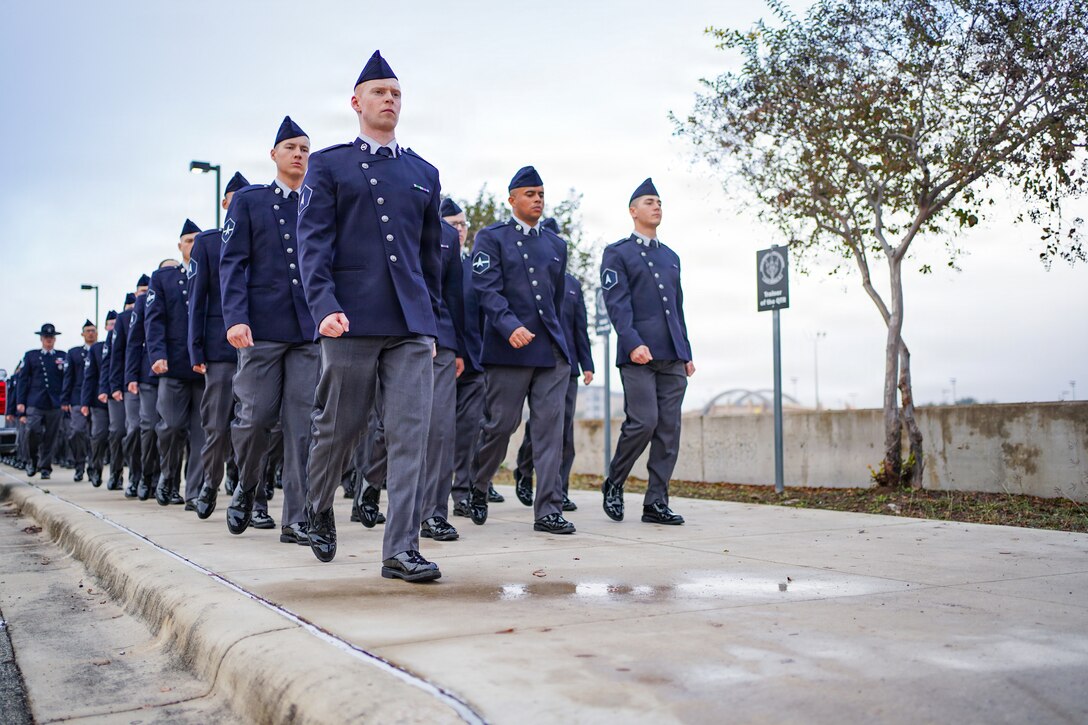 Cadets marching in uniform in formation