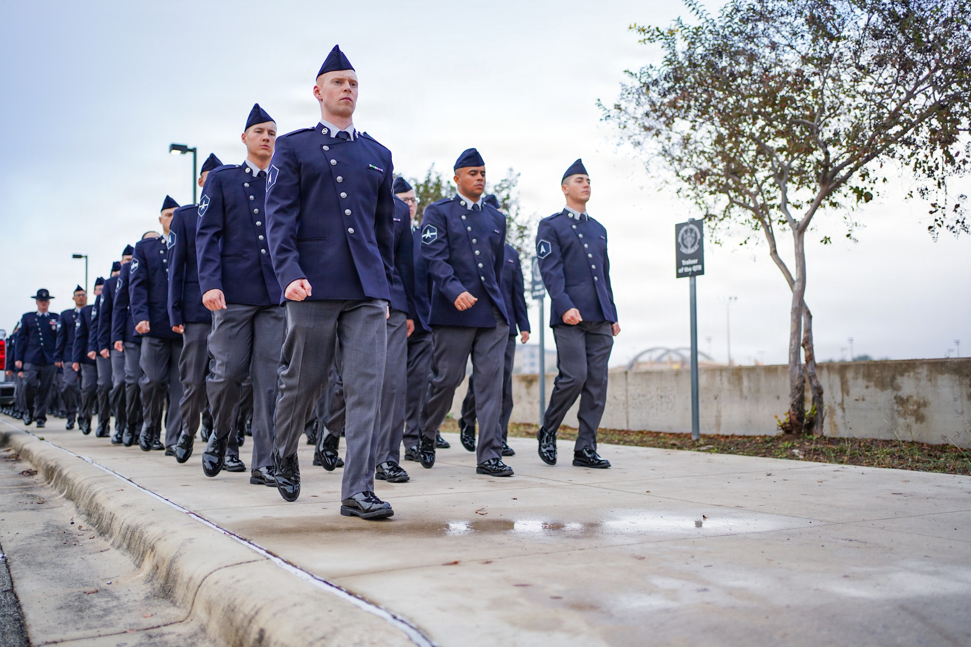 Cadets marching in uniform in formation