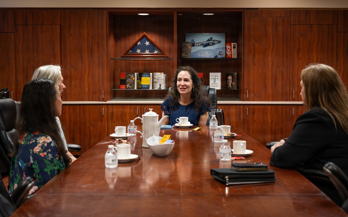 Dr. Wolfe speaks with people