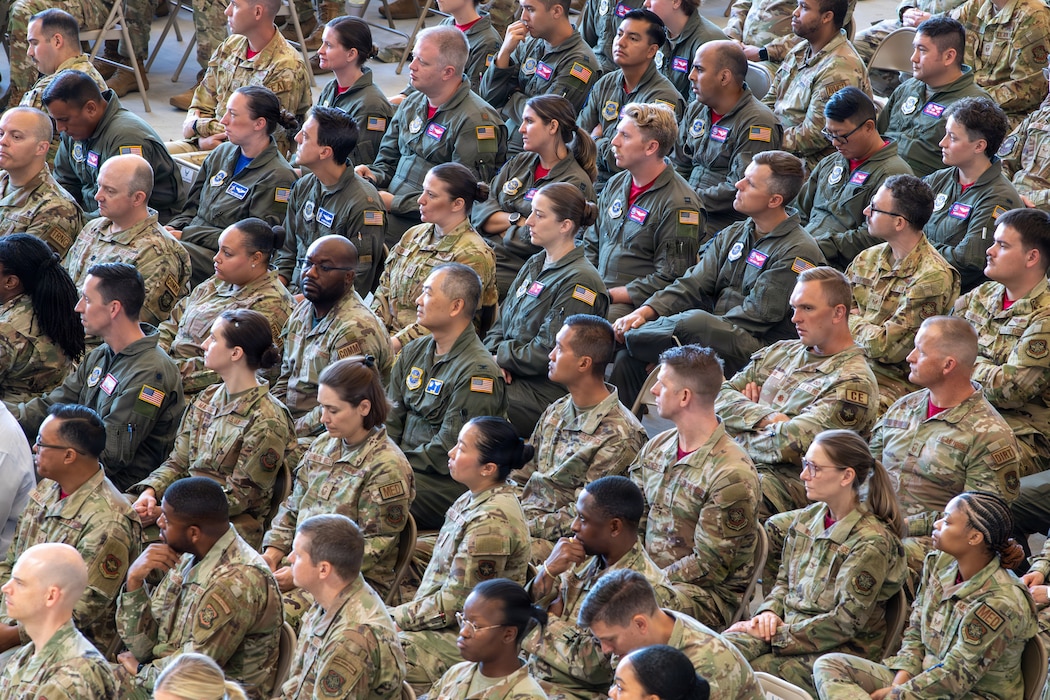 Airmen seating in a crowd