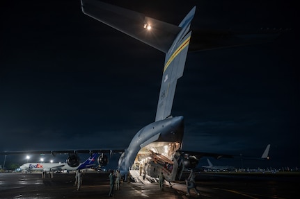 Hawaii Army National Guard Soldiers and Hawaii Air National Guard Airmen begin unloading a Hawaii Army National Guard UH-60M Black Hawk helicopter from a Hawaii Air National Guard C-17 Globemaster III assigned to the 204th Airlift Squadron after arriving at Clark Air Base, Philippines, Aug. 1, 2026.